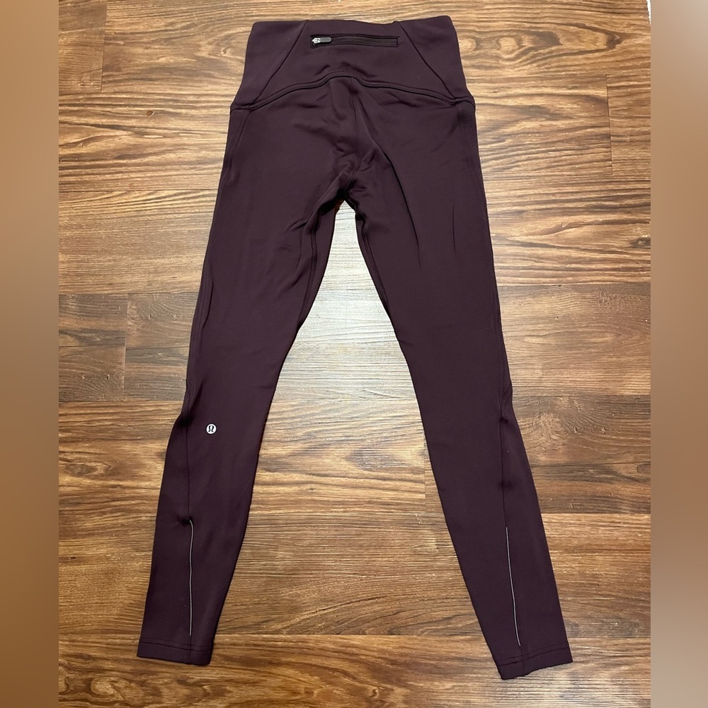 Lululemon Fast As Fleece Tight
Black Cherry Womens Size 4
Reflective Pocket - Picture 5 of 14